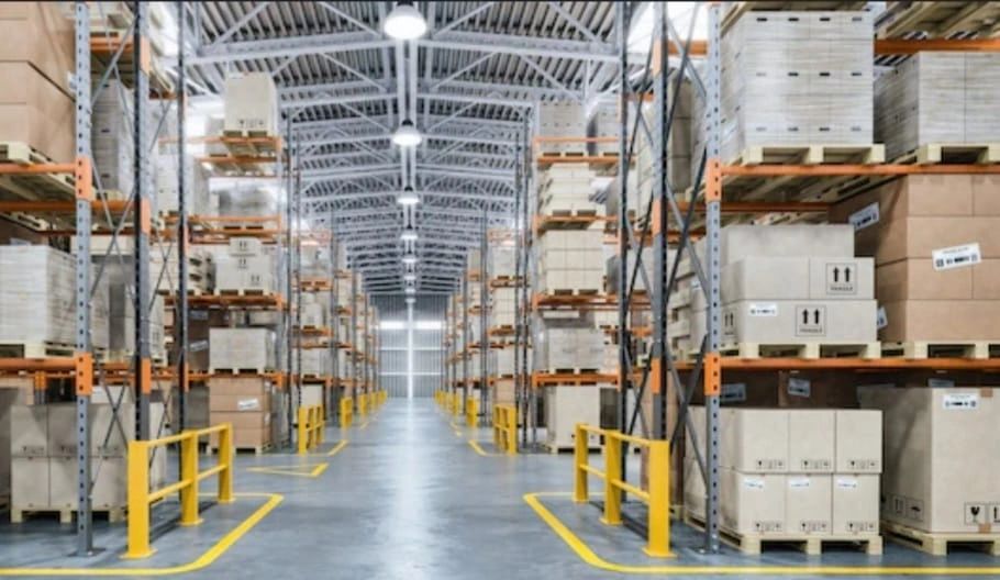 Two Fatman warehouse facility with racking and pallets